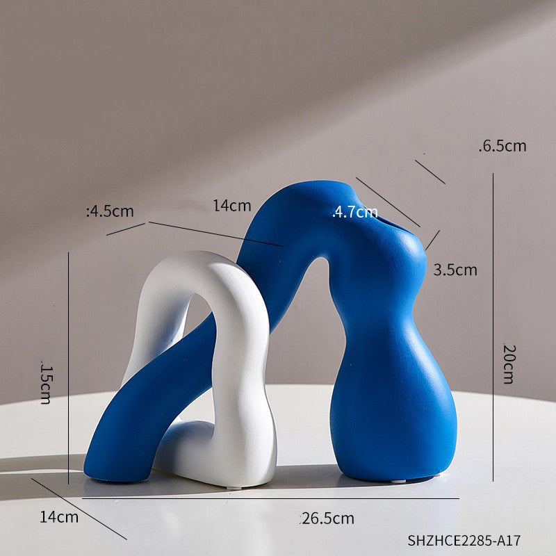 Abstract Character Art Vase Flower Arrangement And Dried Flower Creative TV Cabinet